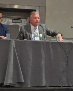 Brian Franciskato speaking at AAJ conference Hague compliance